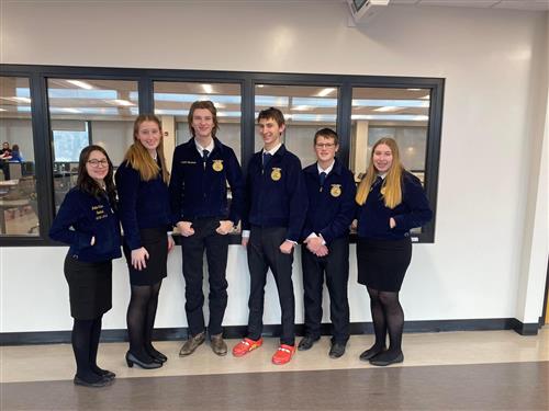 Six FFA members pose for a photo